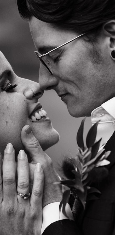 A couple kiss, closeup