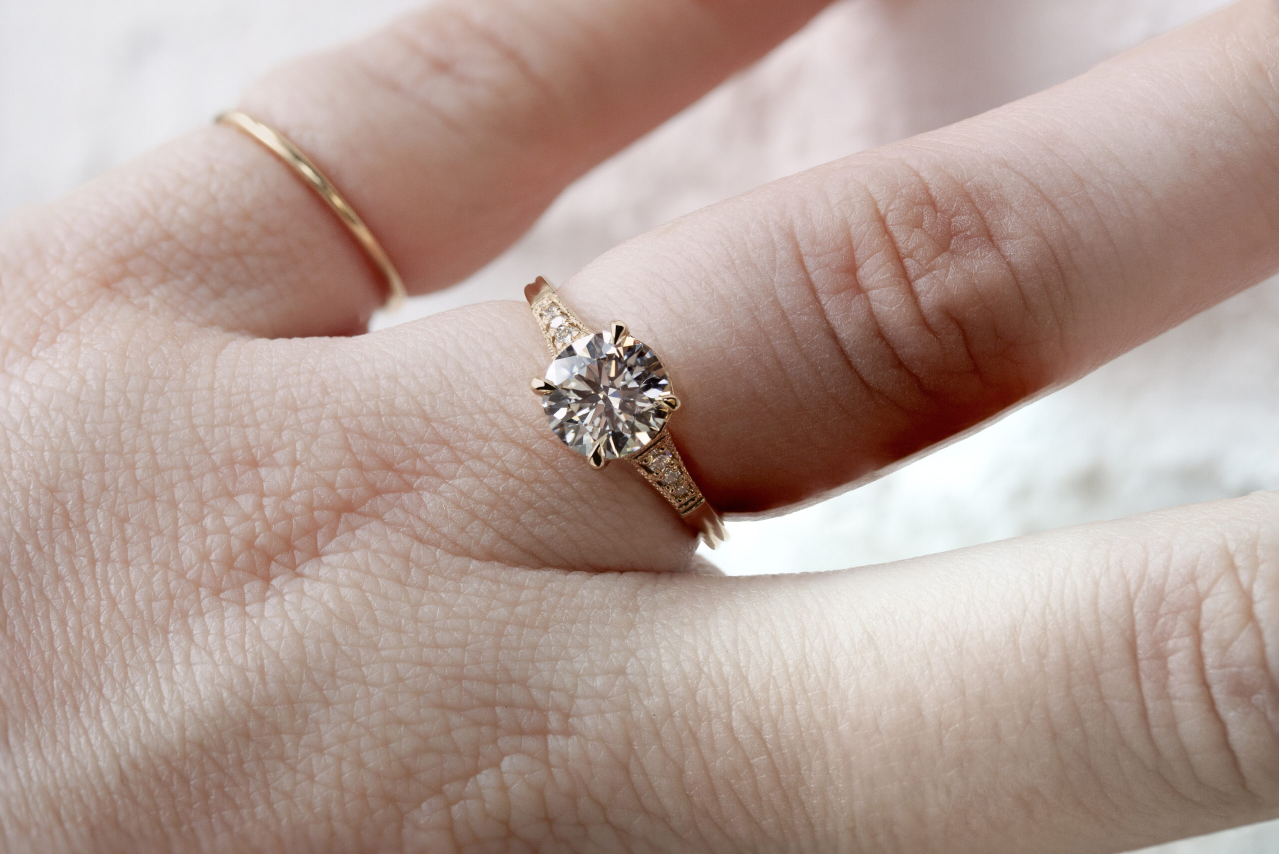 Artemis Ring with vintage-inspired milgrain detail, reclaimed diamonds, and a signature crossed-metal undergallery by Emily Chelsea Jewelry.