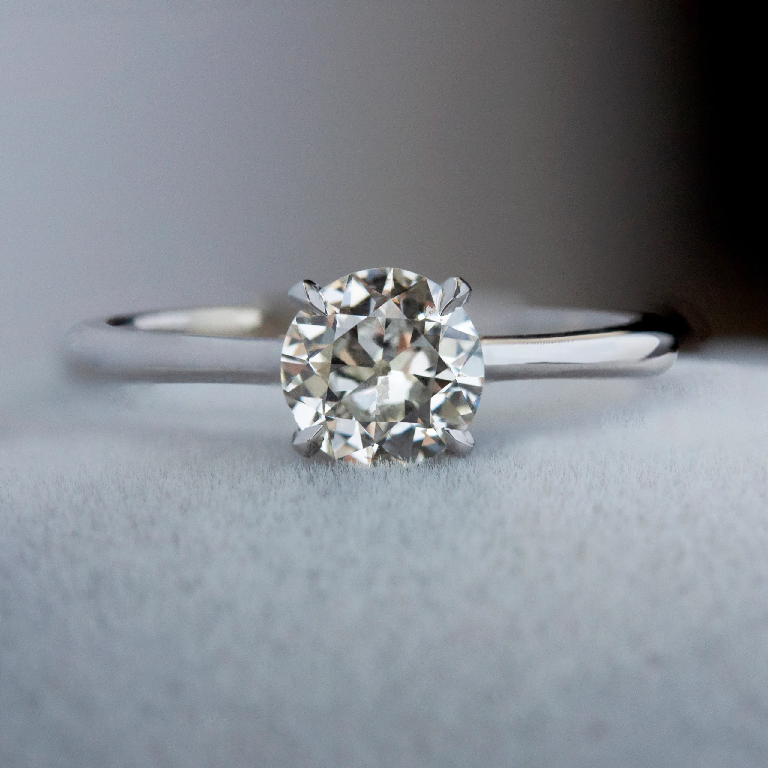 Gather Ring by Philadelphia's Emily Chelsea Jewelry, a custom solitaire inspired by floral elegance with a 2mm band.