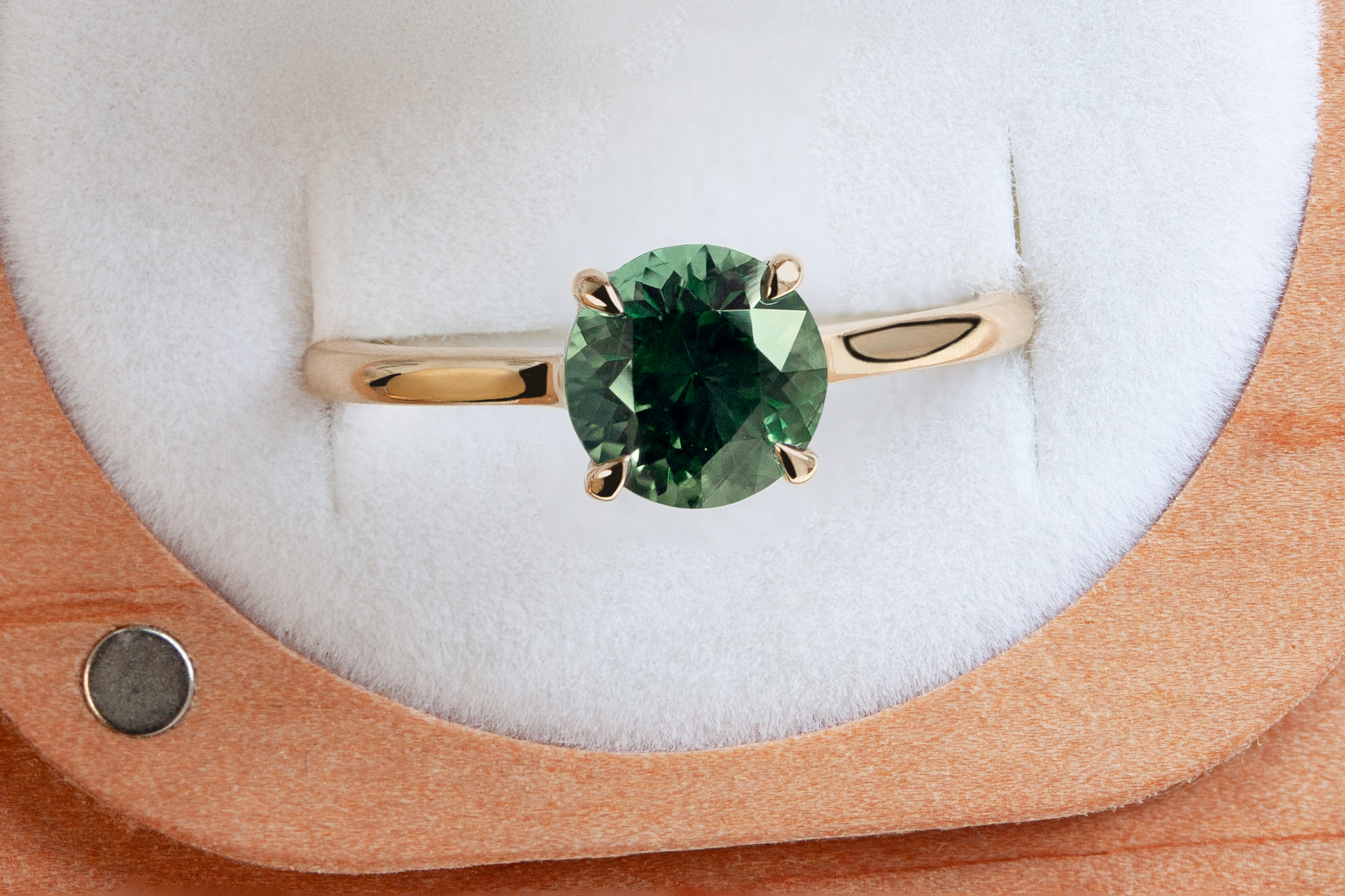 Timeless solitaire ring by Philadelphia's Emily Chelsea Jewelry, with a hidden halo, subtle sparkle, and reclaimed diamonds on a 2mm band.