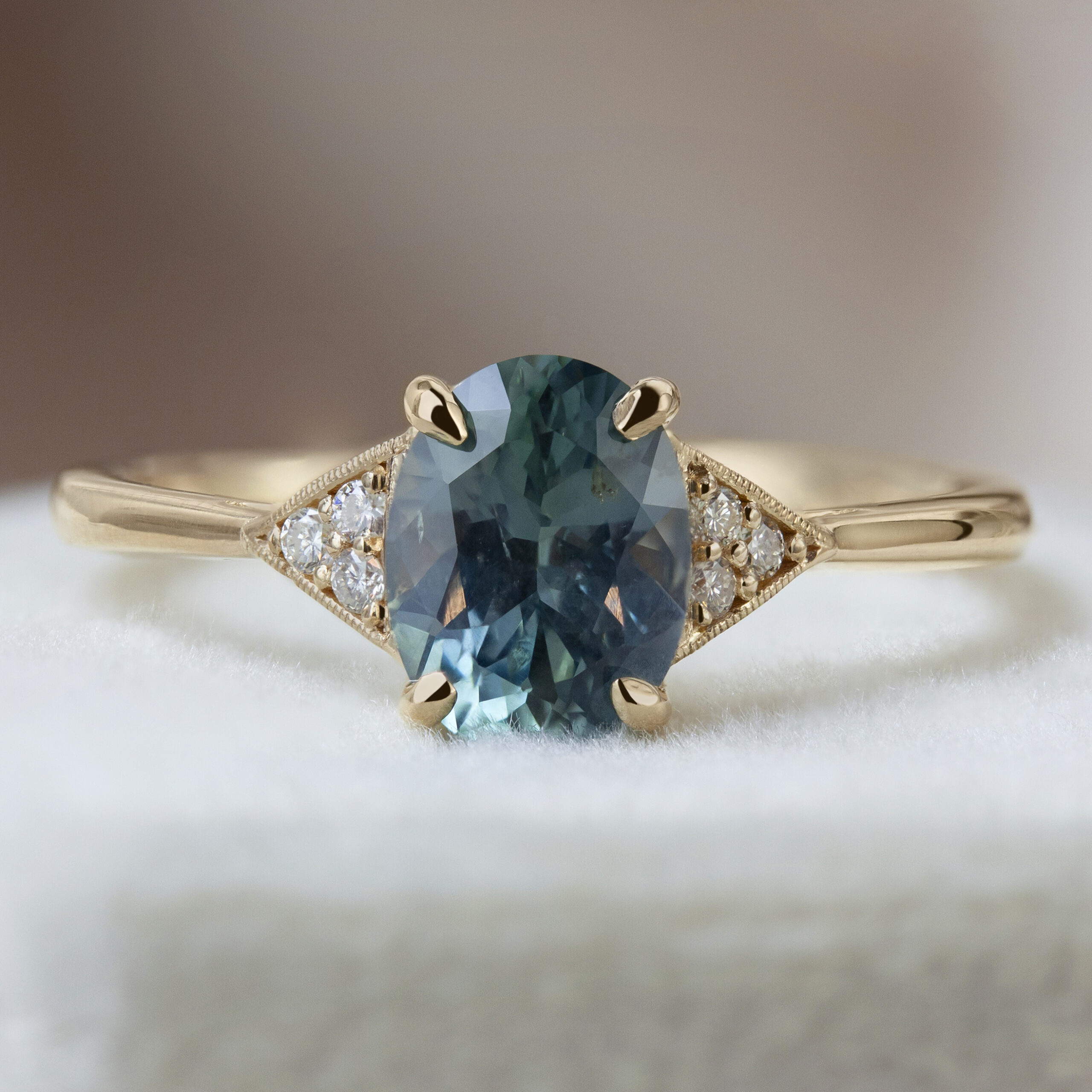 June Ring by Philadelphia's Emily Chelsea Jewelry, featuring a timeless geometric design, delicate sparkle, reclaimed white diamonds, and a teal center stone.