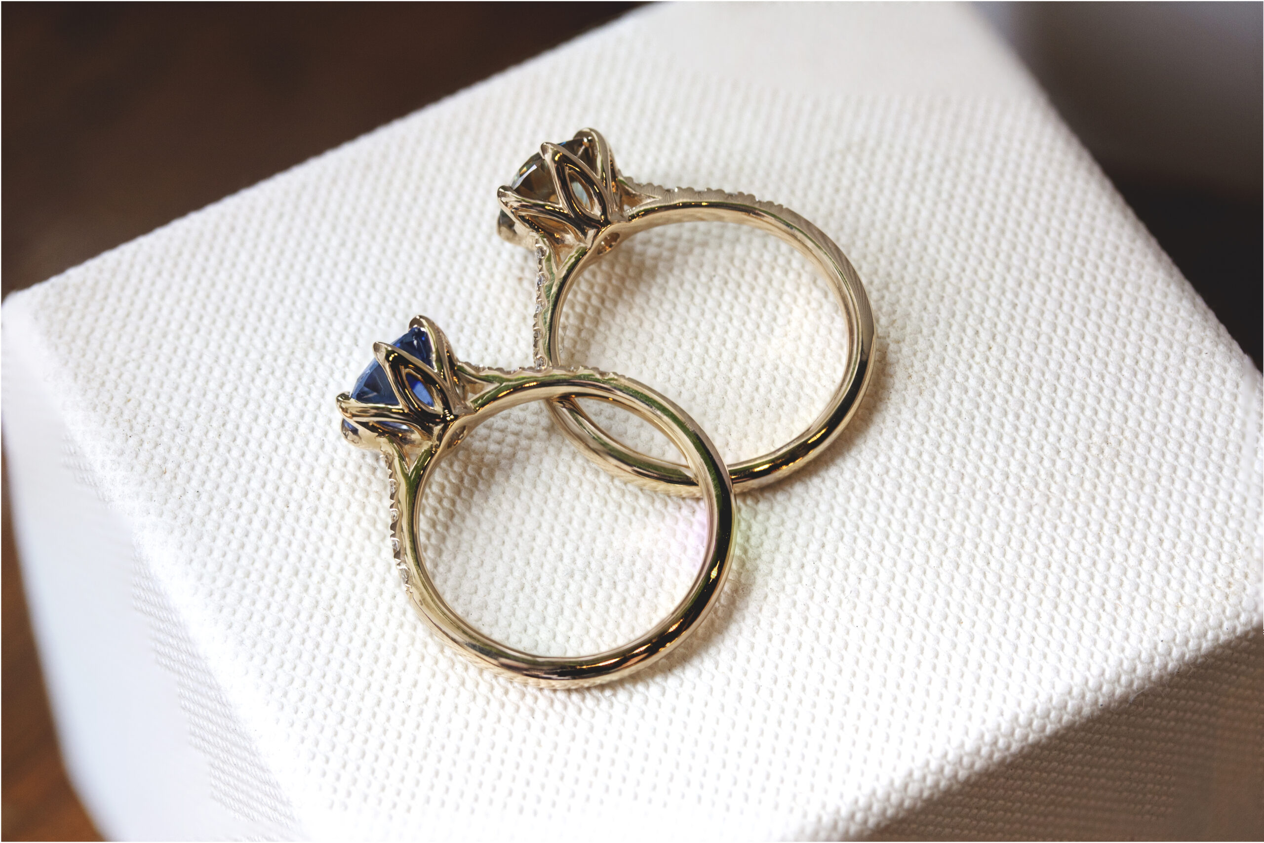 Elegant ring by Philadelphia's Emily Chelsea Jewelry featuring hidden floral prongs, reclaimed diamonds, and a tapered 2mm band.