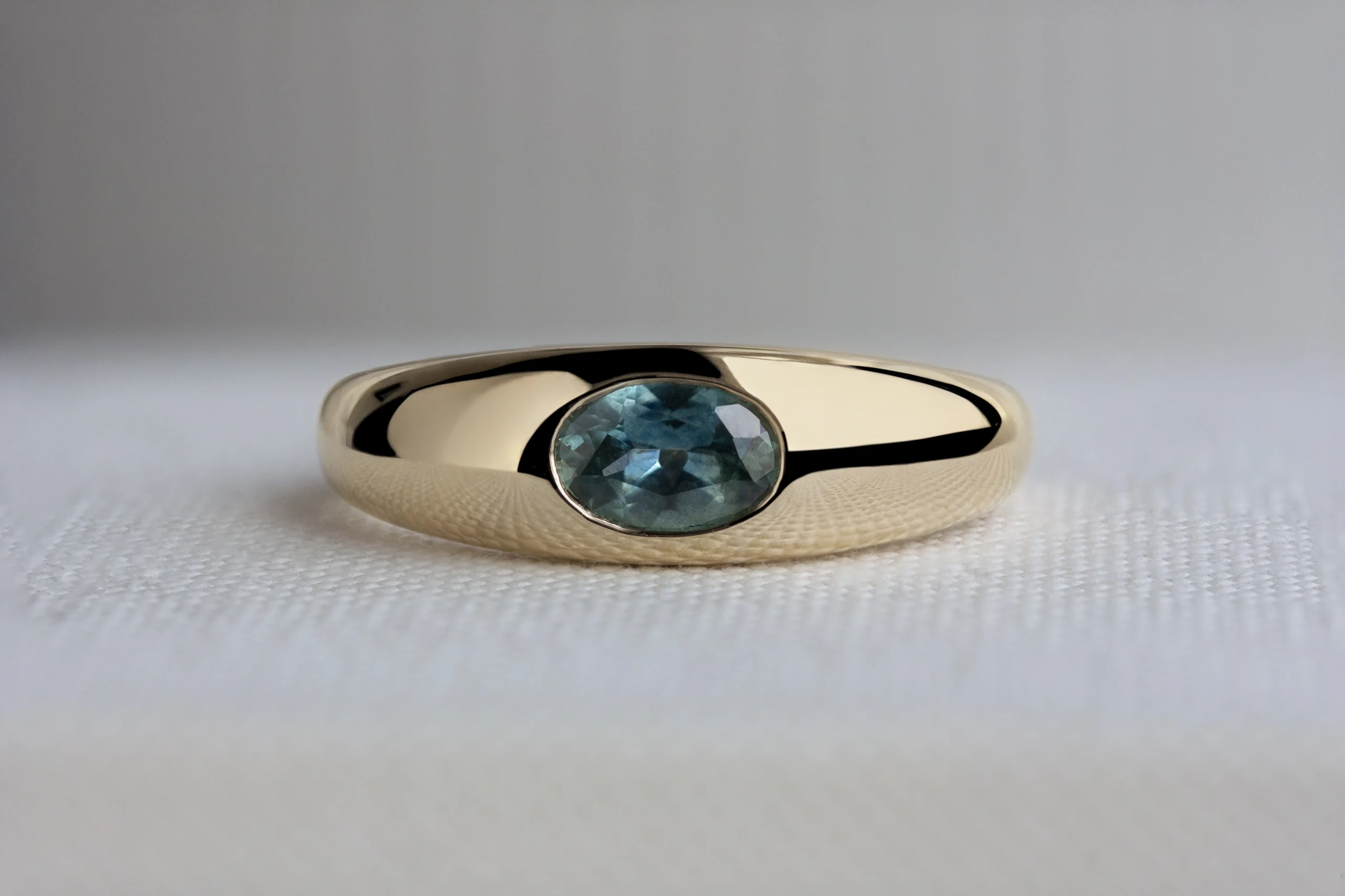 Hague Ring by Philadelphia's Emily Chelsea Jewelry with a low profile, burnished center stone, and 3.5mm band in brushed or polished finish.