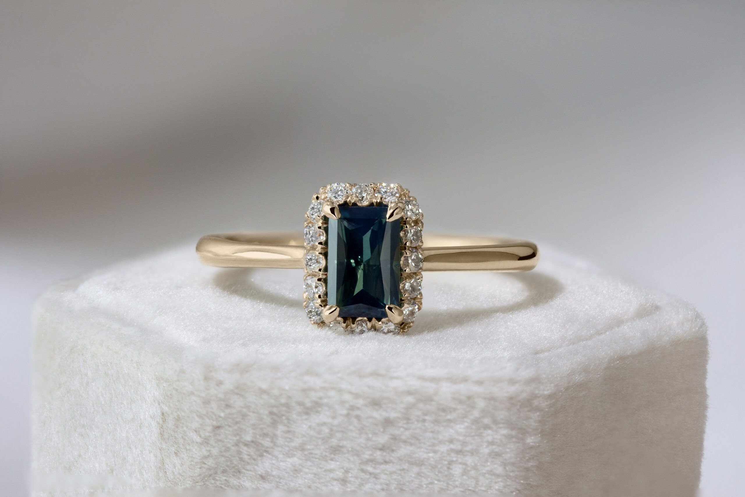 Angled Halo Ring by Philadelphia's Emily Chelsea Jewelry with a diamond halo, reclaimed diamonds, and a 1.8mm band.