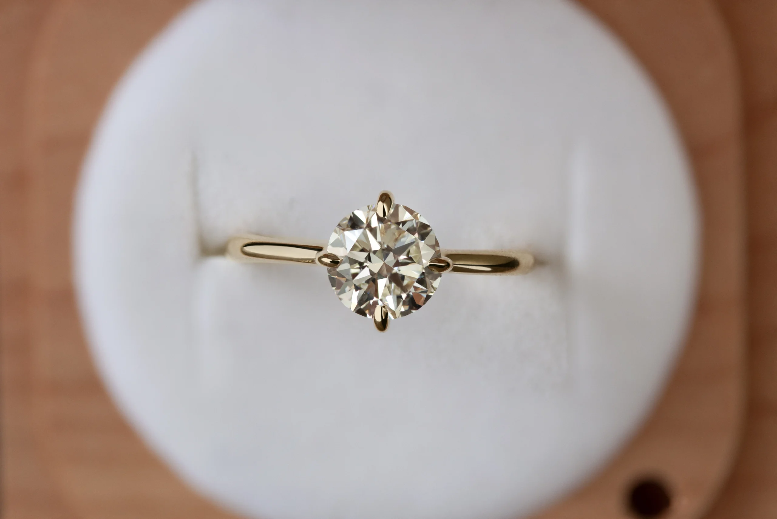 Gather Ring by Philadelphia's Emily Chelsea Jewelry, a custom solitaire inspired by floral simplicity with a 2mm clean band.