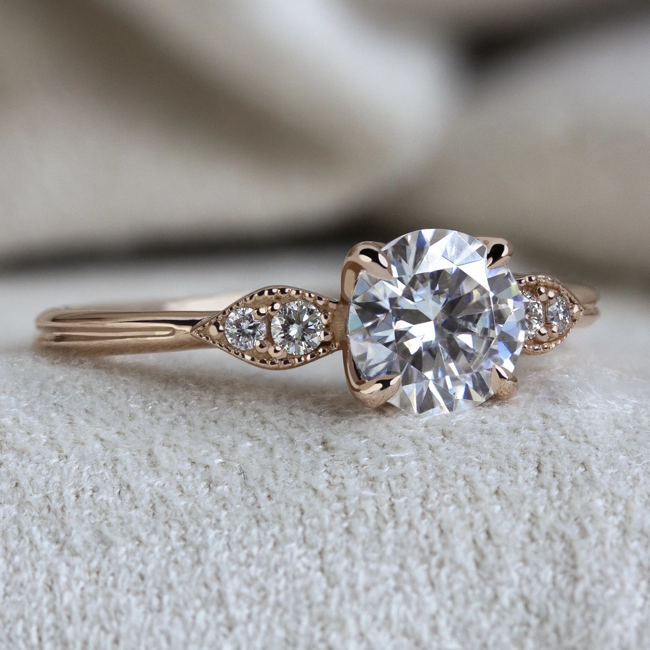 Custom Gardenia Ring by Philadelphia's Emily Chelsea Jewelry with floral details, milgrain texture, and 0.08ctw reclaimed diamonds.