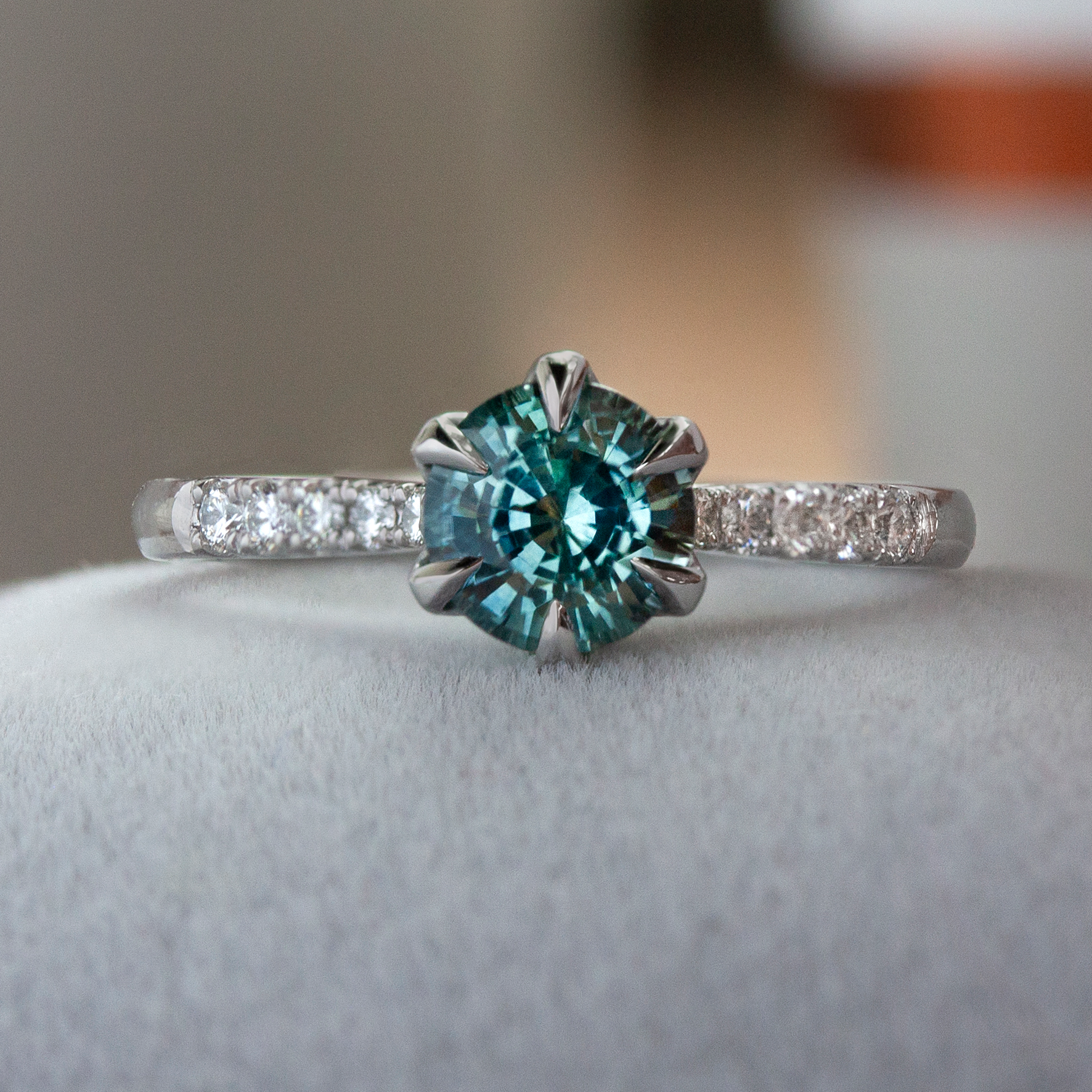 Elegant ring by Philadelphia's Emily Chelsea Jewelry with hidden floral prongs, reclaimed diamonds, and a tapered 2mm band.