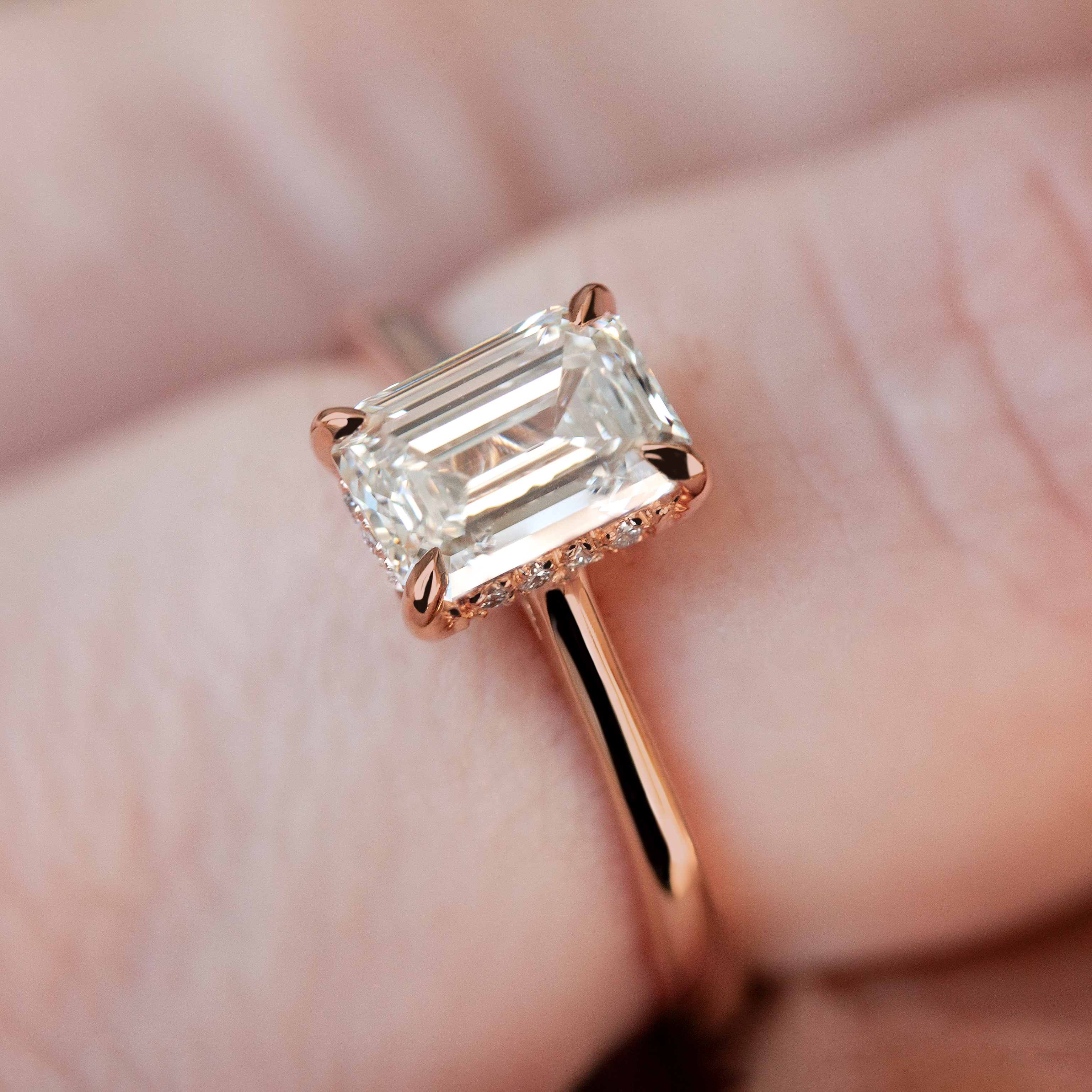 Solitaire ring by Philadelphia's Emily Chelsea Jewelry with a hidden halo, subtle sparkle, reclaimed diamonds, and a 2mm band.