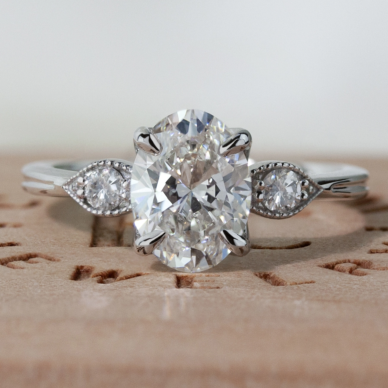 The Gardenia Ring by Philadelphia local jeweler Emily Chelsea Jewelry, featuring vintage-inspired floral details, petal prongs, and 0.08ctw reclaimed diamonds.