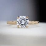 Classic 4-prong solitaire ring by Philadelphia's Emily Chelsea Jewelry with a wheat-pattern textured 1.8mm band.