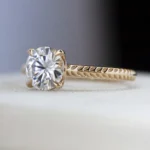 Classic 4-prong solitaire ring by Philadelphia's Emily Chelsea Jewelry with a wheat-pattern textured 1.8mm band.