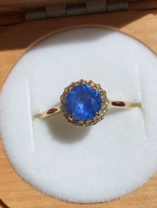 Custom Angled Halo Ring by Philadelphia's Emily Chelsea Jewelry with reclaimed diamonds and a 1.8mm band for 360-degree sparkle.