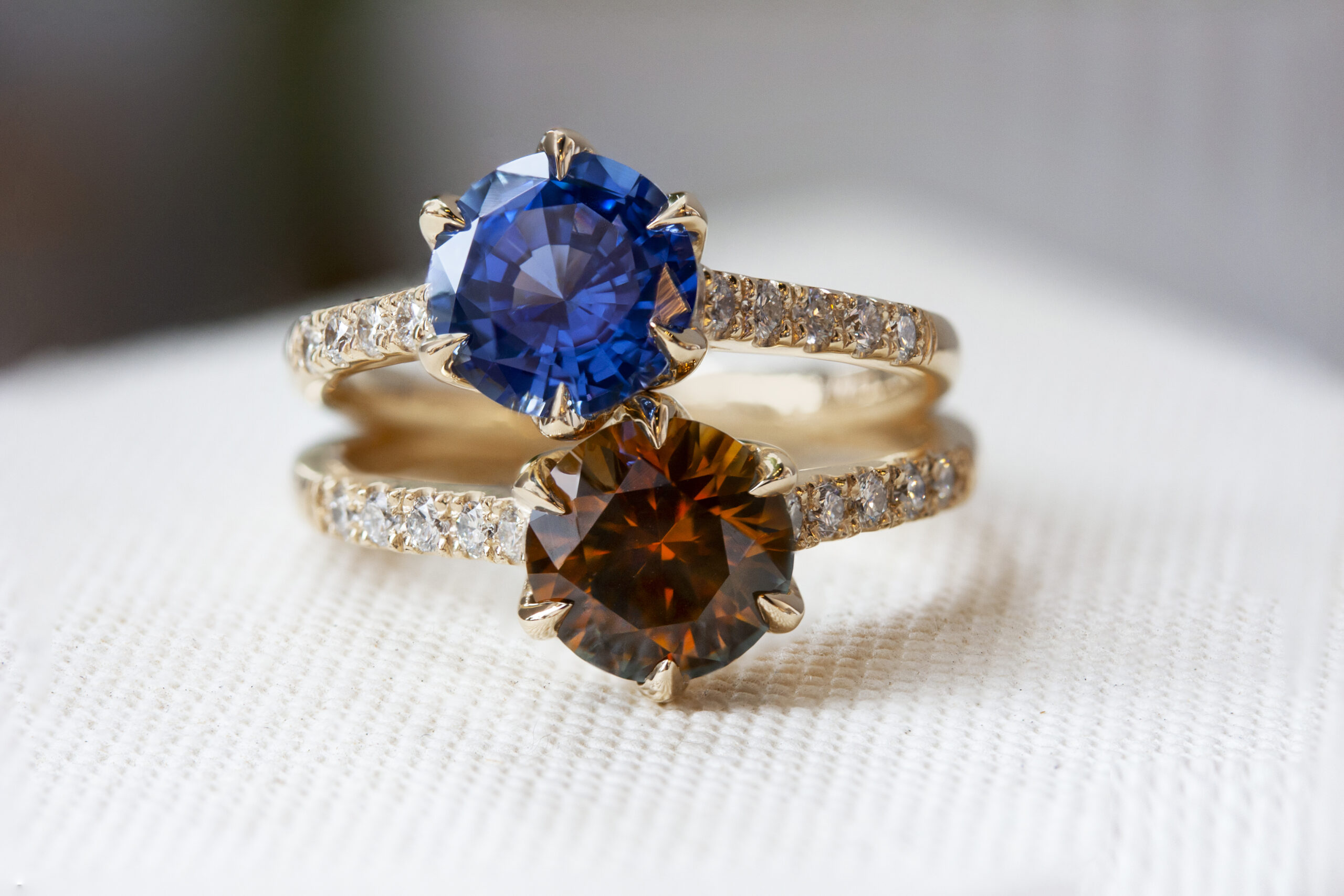 Custom floral-inspired ring by Philadelphia's Emily Chelsea Jewelry with hidden flower prongs, reclaimed diamonds, and a tapered 2mm band.