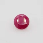 1.74ct round red ruby from Liberia, 7mm diameter, unknown treatment. Emily Chelsea Custom Jeweler in Philadelphia.