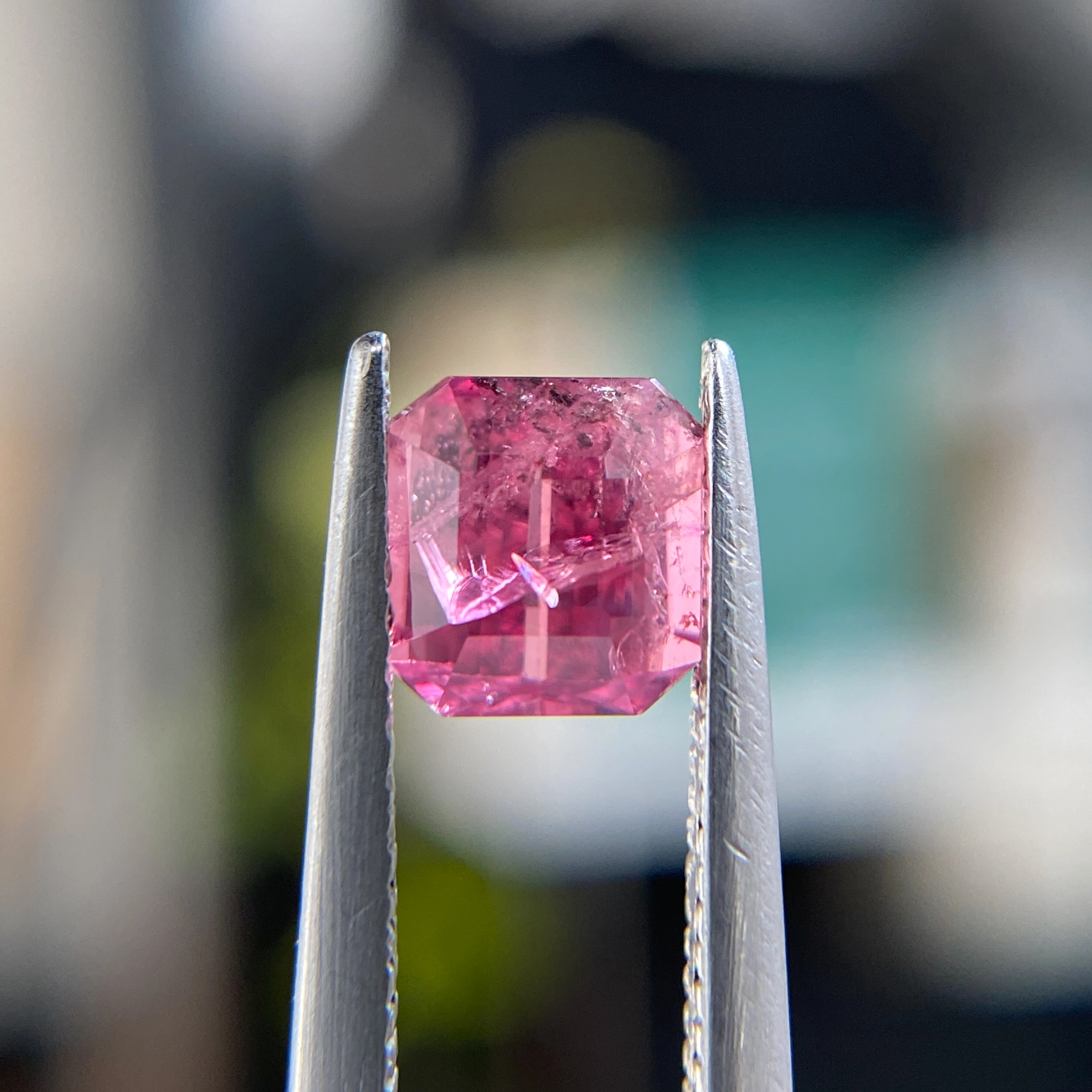 1.33ct unheated emerald-cut reddish pink Winza sapphire, 5.69mm x 5.41mm. Rare color-zoned gem. Emily Chelsea Custom Jeweler in Philadelphia.