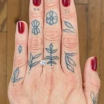Woman's hand showing a diamond - Emily Chelsea Jewelers