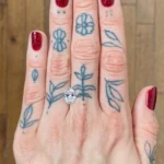 Woman's hand showing a diamond - Emily Chelsea Jewelers