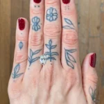 Woman's hand showing a diamond - Emily Chelsea Jewelers