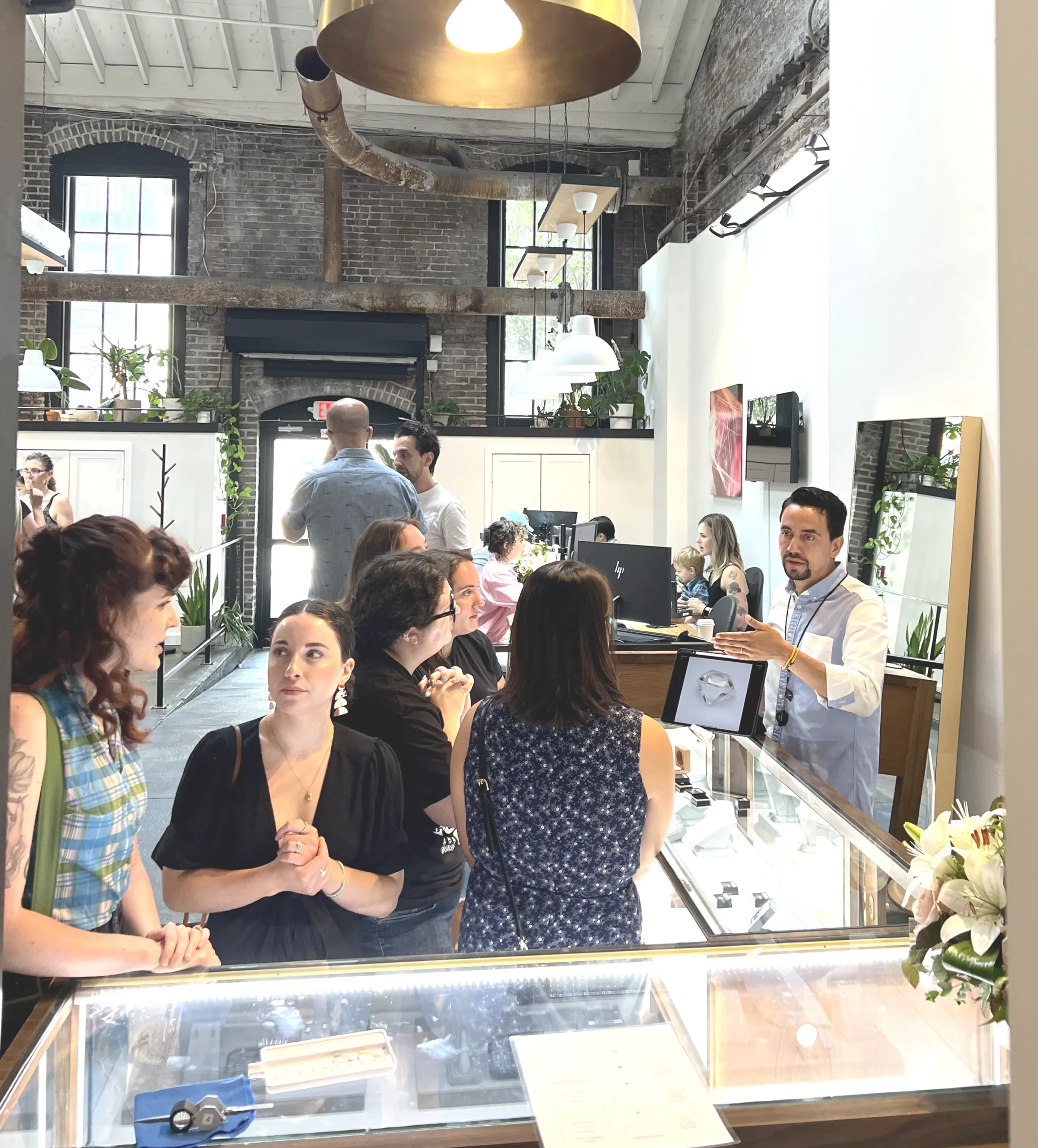 A group of people inside Emily Chelsea Jewelry