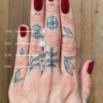 Woman's hand showing diamonds in 1.5ct, 2.0ct, 2.5ct, and 3.0ct for Emily Chelsea Jewelers.