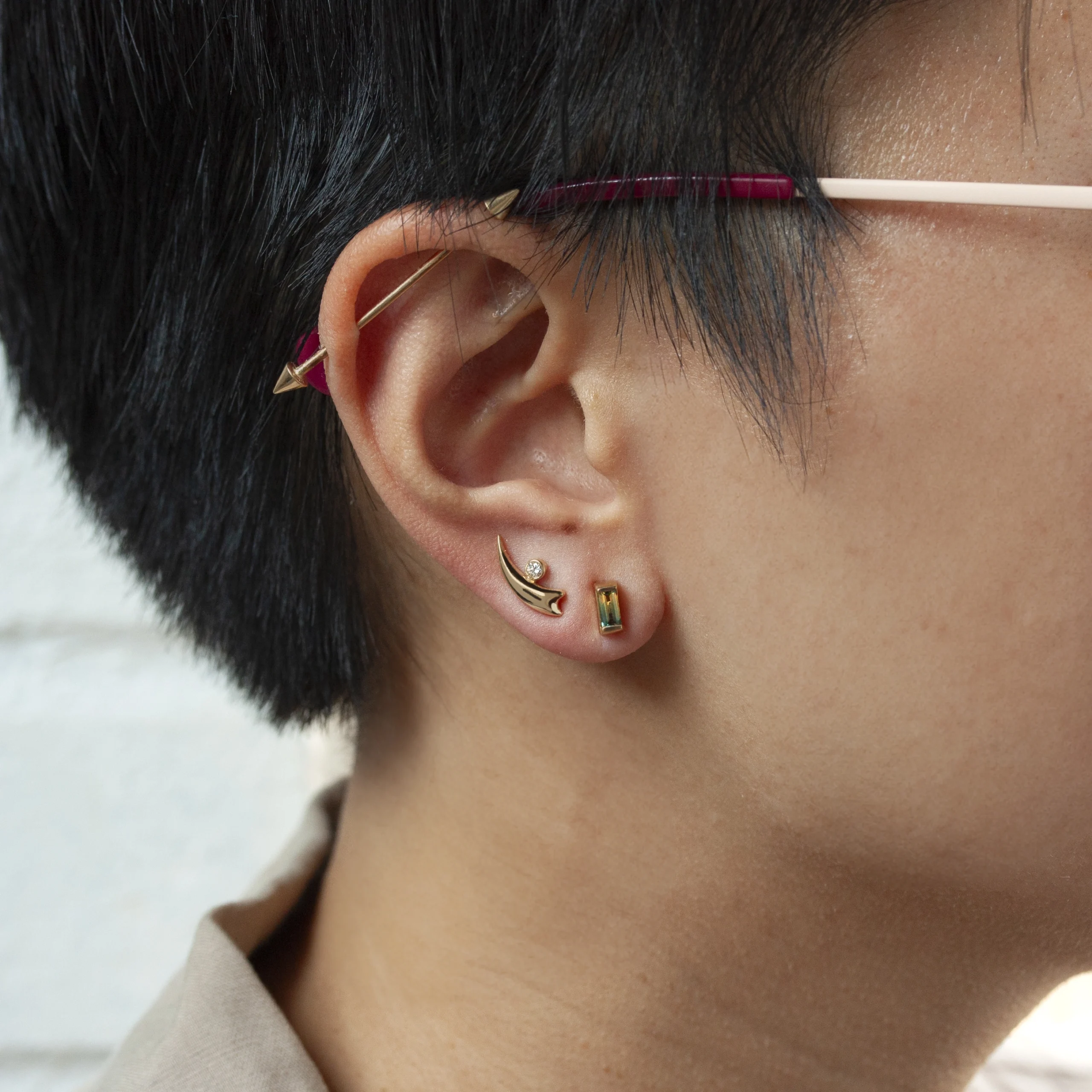 Bar-set stud earrings by Philadelphia’s Emily Chelsea Jewelry, featuring 6x3mm Australian baguette bicolor sapphires with a blue-to-yellow gradient.