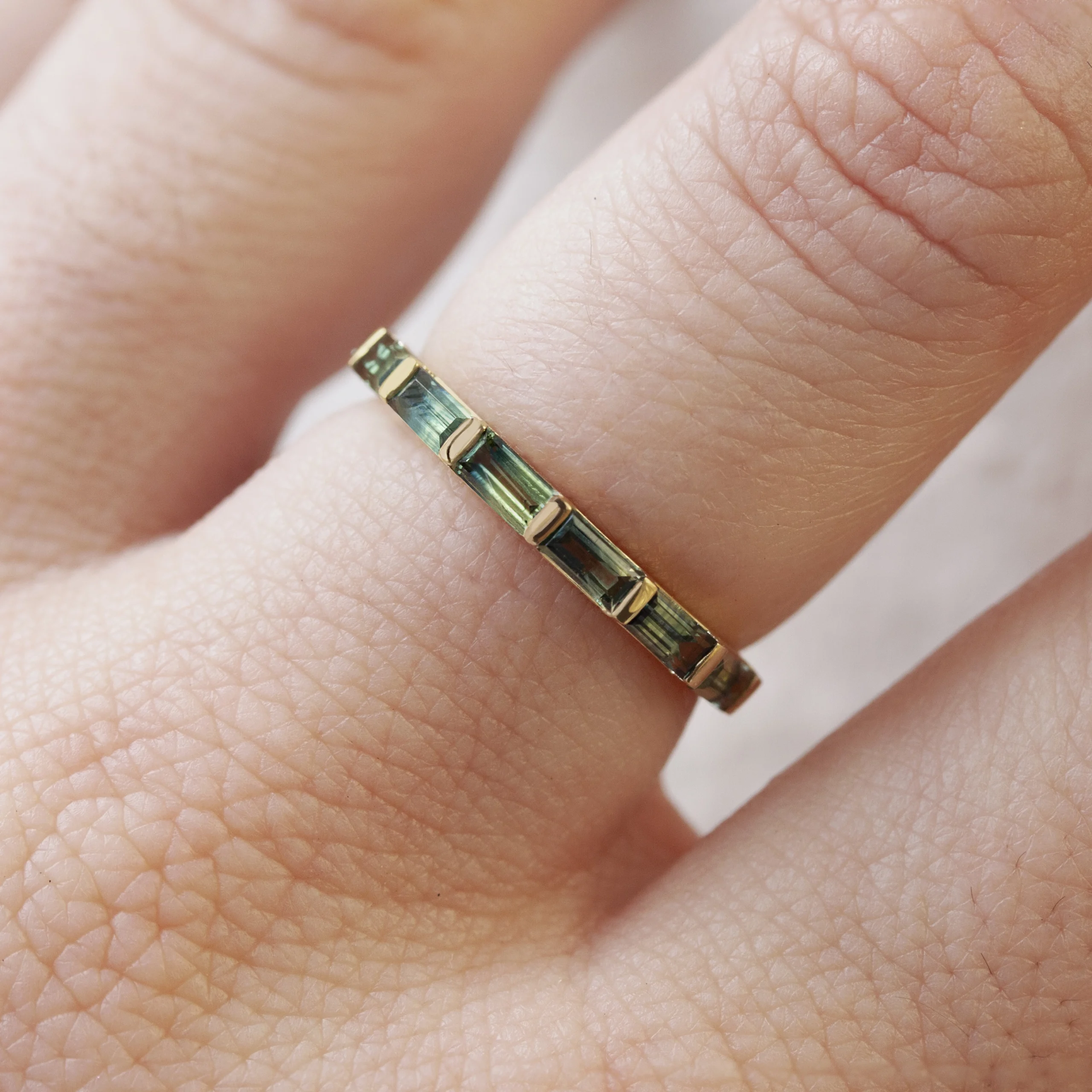 Sapphire bar ring by Philadelphia’s Emily Chelsea Jewelry, 14k yellow gold.