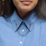 Hand in Hand Collar Pin by a Philadelphia local jeweler, featuring Uruguayan amethyst cabochons, sterling silver chains, and gold accents. Custom designed.