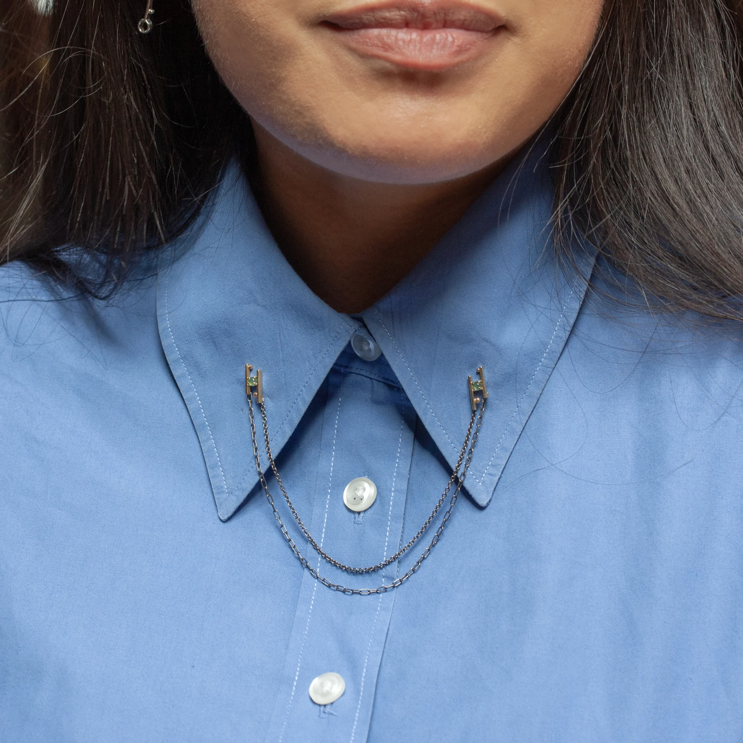 Hand in Hand Collar Pin by Philadelphia’s Emily Chelsea Jewelry, featuring Indian moss agate, gold stations, and oxidized sterling silver chains.