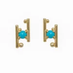 Hand in Hand Stud Earrings by Philadelphia’s Emily Chelsea Jewelry, featuring Arizonian turquoise cabochons set between sleek metal bars.