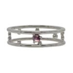 Pinnacle Hoops by Emily Chelsea Jewelry, custom hoops with Uruguayan amethyst, Tanzanian lavender spinel, and sleek metal accents.