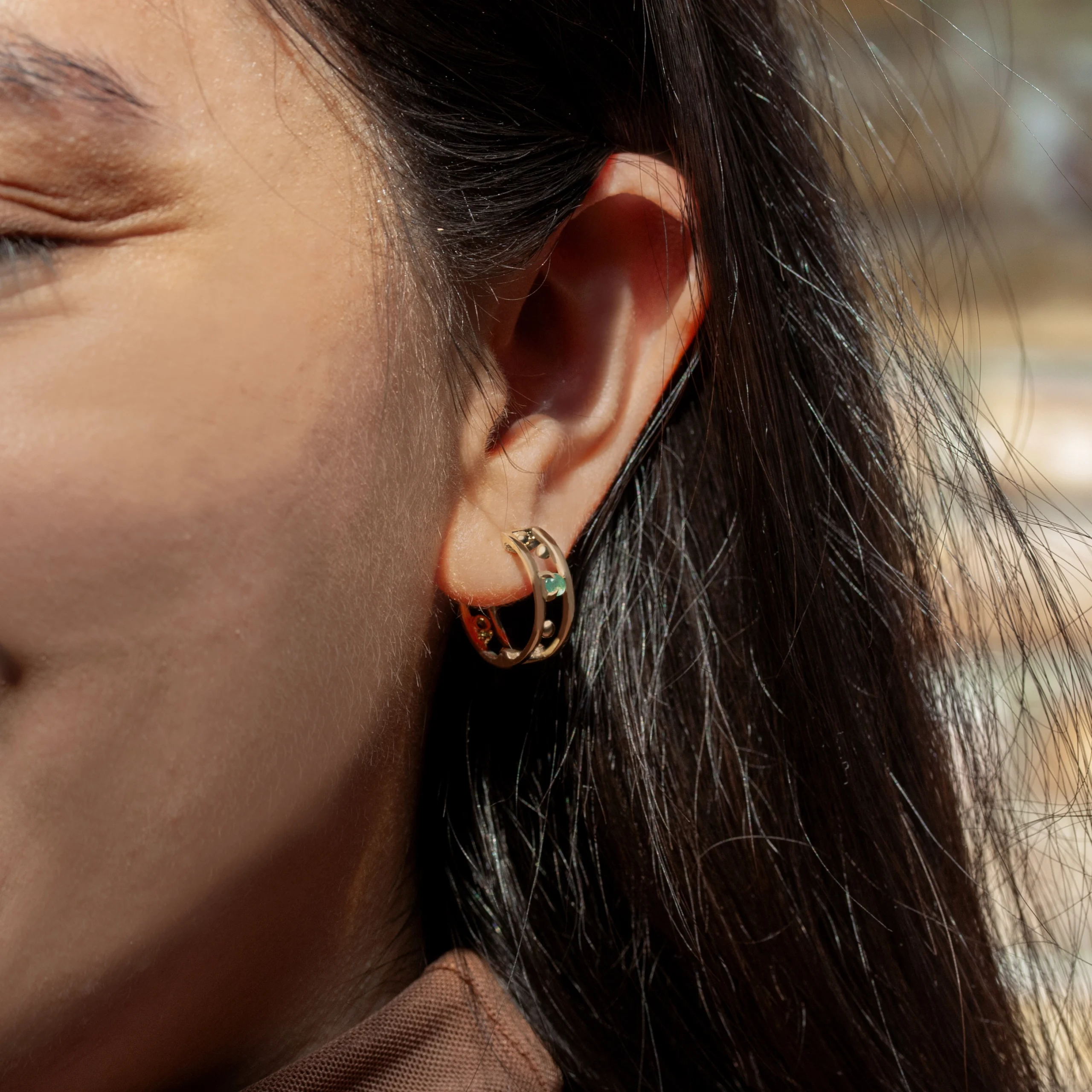 Pinnacle Hoops by Emily Chelsea Jewelry, custom hoops with Indian moss agate, Nigerian green tourmaline, and polished metal accents.