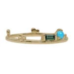 The Renewal Band from Emily Chelsea Jewelry, featuring 3mm Arizonian turquoise and 4x2mm Nigerian teal tourmaline, symbolizing life's milestones and progress.