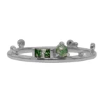 The Renewal Band by Emily Chelsea Jewelry, featuring 3mm Indian moss agate cabochon and 4x2mm baguette, symbolizing milestones and progress.