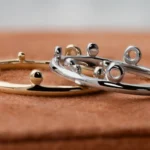The Renewal Band, custom-designed by Philadelphia jeweler Emily Chelsea Jewelry, features a minimalist design symbolizing milestones and moving forward.
