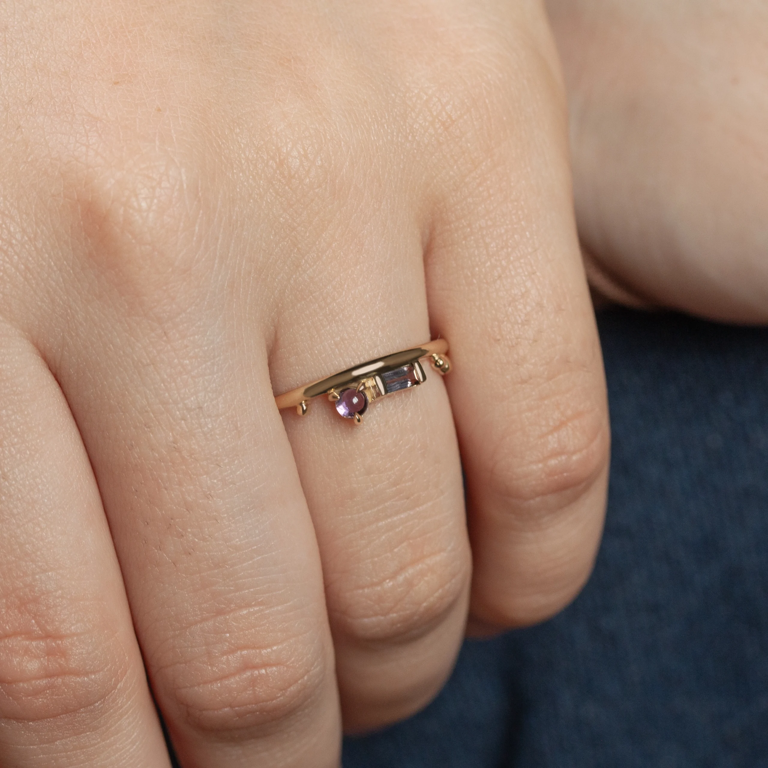 The Renewal Band, features 3mm Uruguayan amethyst and Tanzanian lavender spinel baguette, custom-designed by Philadelphia jeweler Emily Chelsea Jewelry.