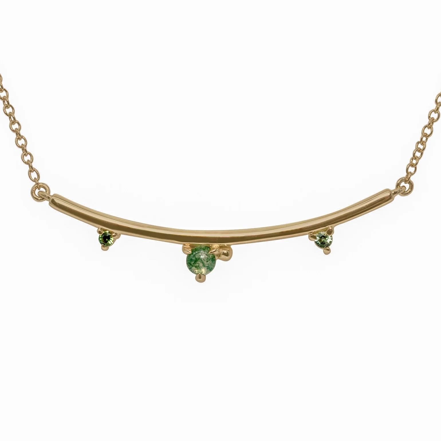 Arc Necklace by Philadelphia’s Emily Chelsea Jewelry, featuring Indian moss agate, Nigerian green tourmaline, and a gracefully curved design.