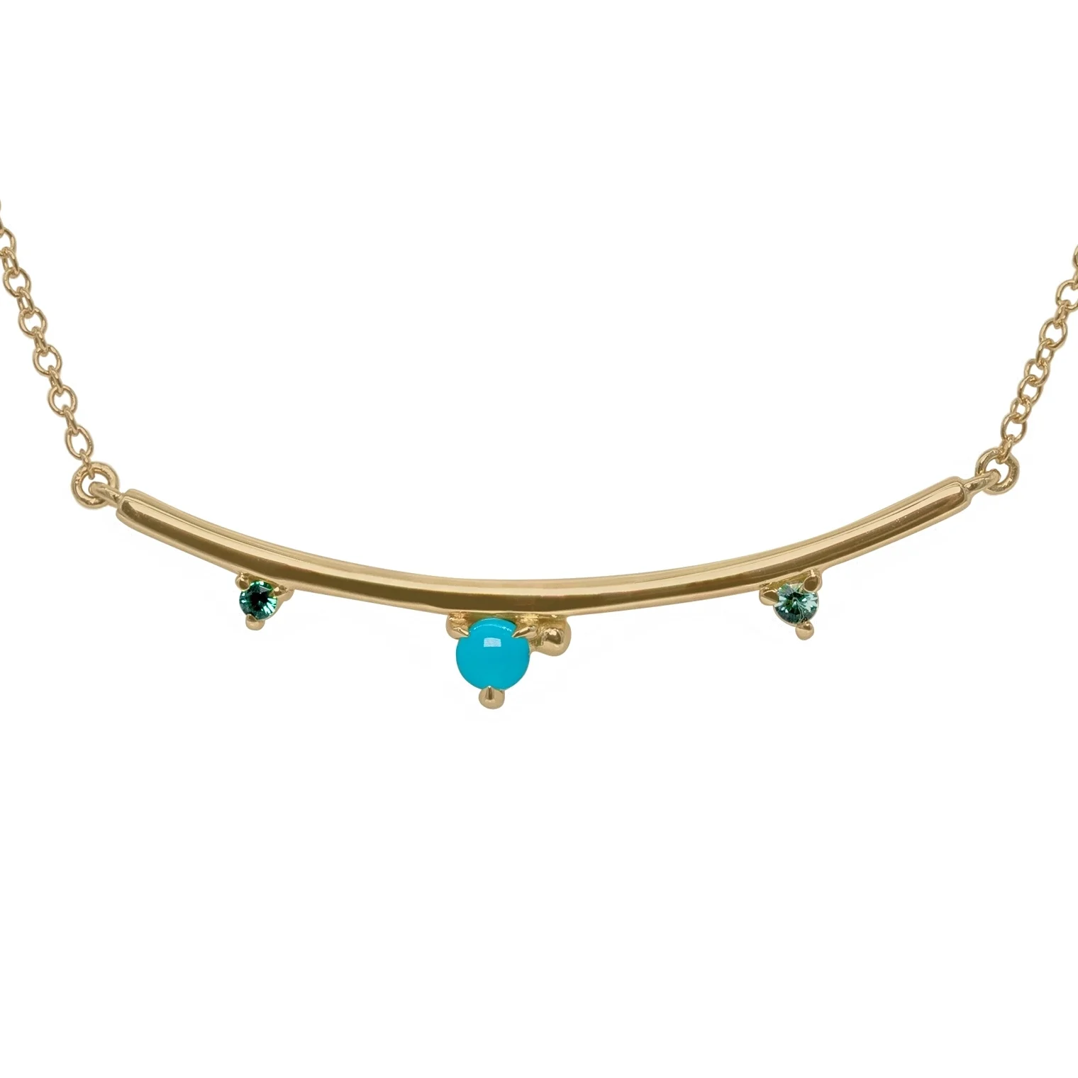 Arc Necklace by Philadelphia’s Emily Chelsea Jewelry, featuring Arizonian turquoise, Nigerian teal tourmaline, and a delicate curved design.