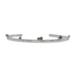 Silver Lining Cuff by Philadelphia’s Emily Chelsea Jewelry, featuring Indian moss agate, Nigerian green tourmaline, and a polished finish symbolizing optimism.
