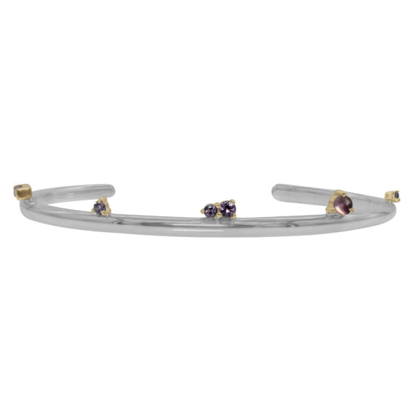 Silver Lining Cuff by Philadelphia’s Emily Chelsea Jewelry, featuring Uruguayan amethyst, Tanzanian lavender spinel, and a polished finish symbolizing optimism.