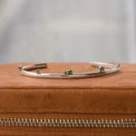 Silver Lining Cuff by Philadelphia’s Emily Chelsea Jewelry, featuring Turquoise and Tourmaline - Silver and 14kt White Gold.