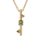 Through It All Necklace by Emily Chelsea Jewelry, a custom design with Indian moss agate, Nigerian green tourmaline, and a symbolic interrupted metal bar motif.