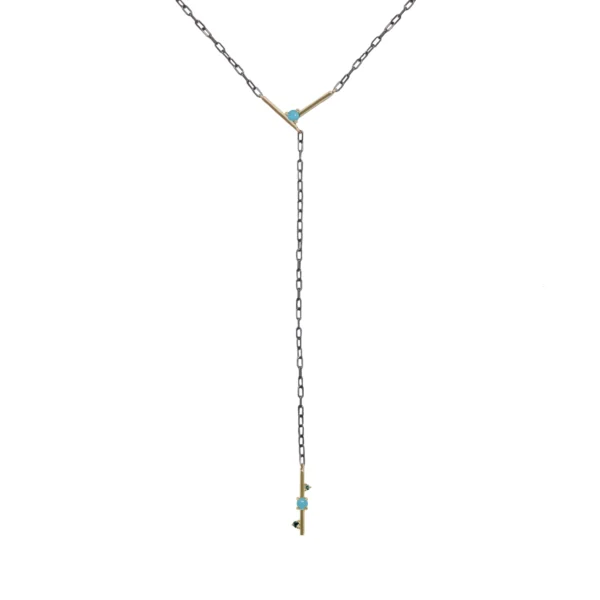 Plunge necklace with turquoise symbolizing milestones and strength, custom-designed by local jeweler Emily Chelsea Jewelry in Philadelphia.
