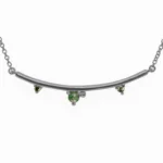 The Arc Necklace by Emily Chelsea Jewelry features Arizonian turquoise and Nigerian teal tourmaline. A perfect staple piece from the Space and Time collection.