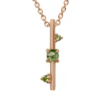 Through It All Necklace with Indian moss agate and Nigerian green tourmaline, symbolizing strength and resilience. Custom design by Emily Chelsea Jewelry.