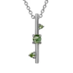 Through It All Necklace by local Philadelphia jeweler Emily Chelsea Jewelry features Arizonian turquoise, Nigerian teal tourmaline, and a symbolic metal bar motif.