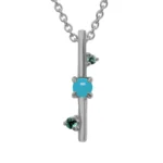 Through It All Necklace by local Philadelphia jeweler Emily Chelsea Jewelry features Arizonian turquoise, Nigerian teal tourmaline, and a symbolic metal bar motif.