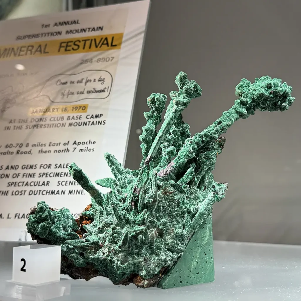 Malachite on Copper, crystal specimen displayed at the Alfie Museum.