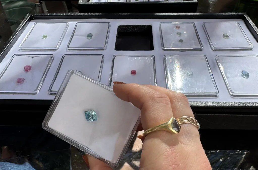 Emily selecting gemstones at the Tucson Gem Show
